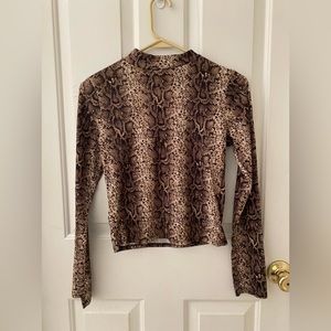 Olivia Rae Snake/cheetah pattern long sleeve  loose turtleneck